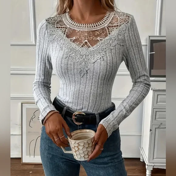 This is a grey long-sleeve ribbed knit sweater top with a lace trim v-neck. Sz L - Picture 1 of 9